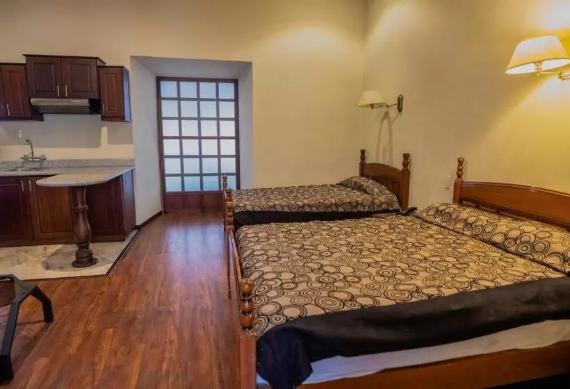 Suites & Hotel El Quijote