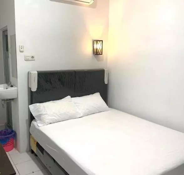 ホテル Guest House Idm Inn Palu Redpartner