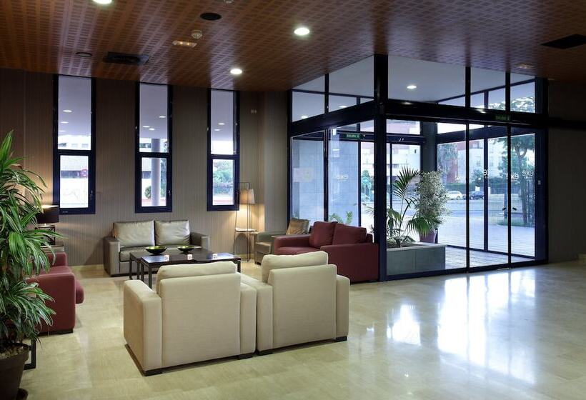 Отель Exe Sevilla Palmera