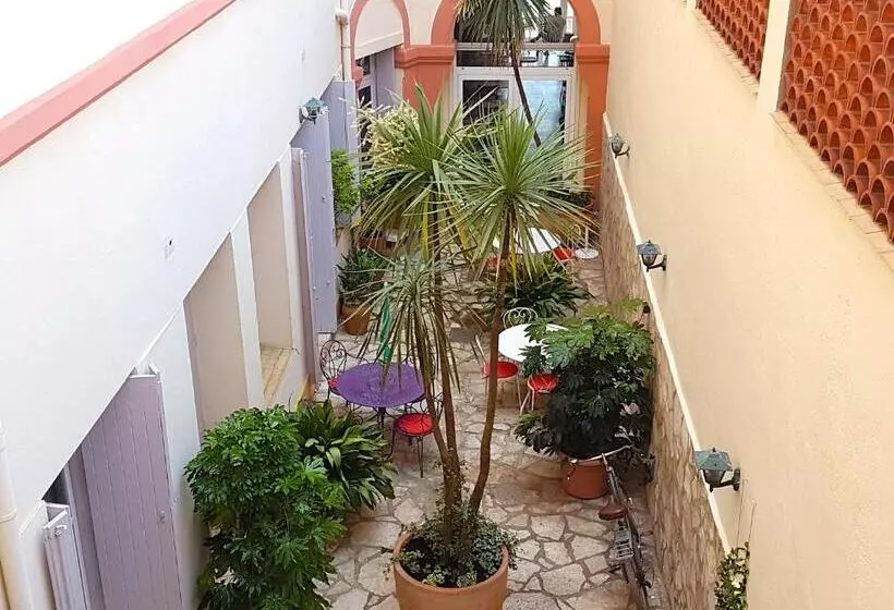 هتل Hôtel L Orque Bleue