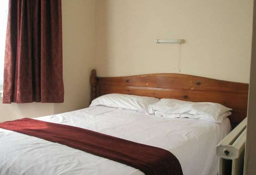 בית מלון כפרי Langham Court