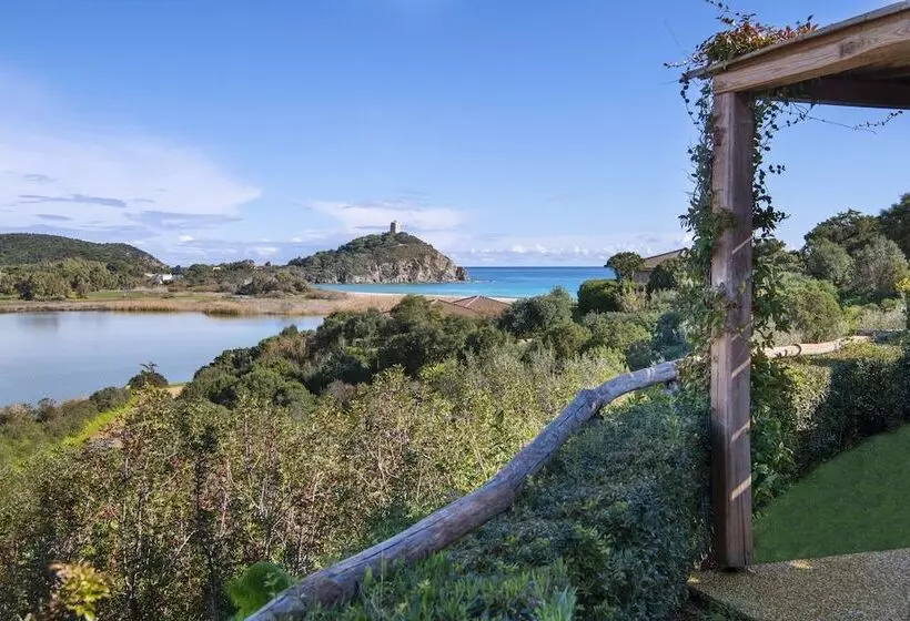 ホテル Baia Di Chia Resort Sardinia, Curio Collection By Hilton