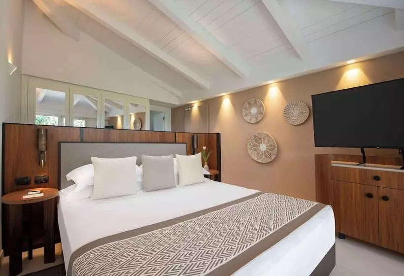 ホテル Baia Di Chia Resort Sardinia, Curio Collection By Hilton