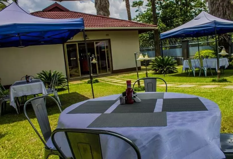 تختخواب و صبحانه Rosewood Lodge