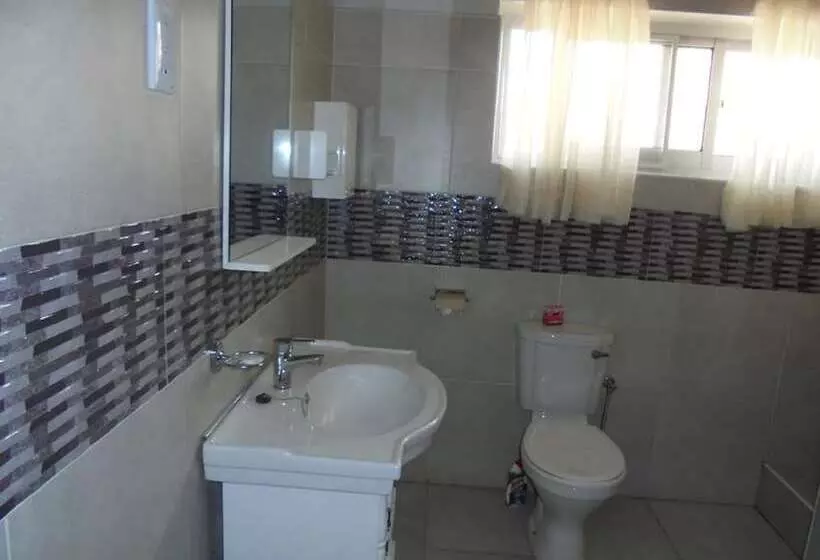 تختخواب و صبحانه Rosewood Lodge