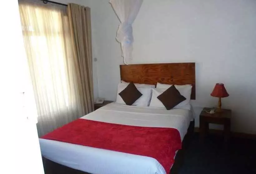 تختخواب و صبحانه Rosewood Lodge