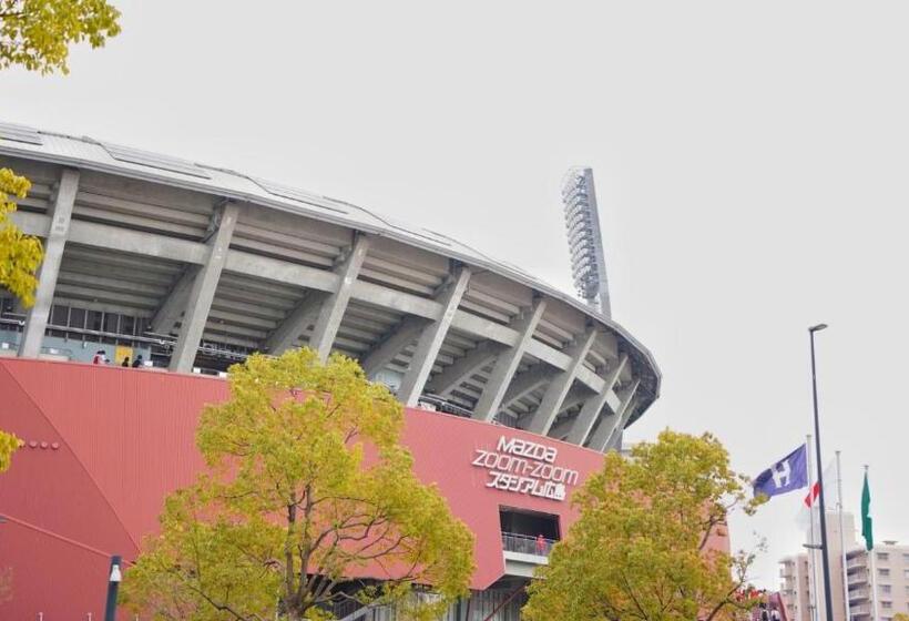 בית מלון כפרי Toyoko Inn Hiroshimaeki Stadium Mae