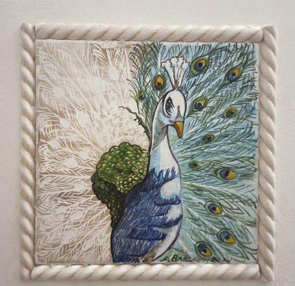 تختخواب و صبحانه Il Pavone