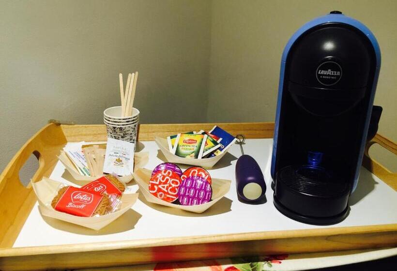 تختخواب و صبحانه Il Pavone