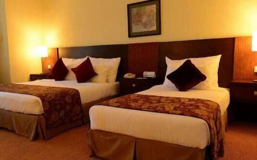 Отель The Grand Puteri