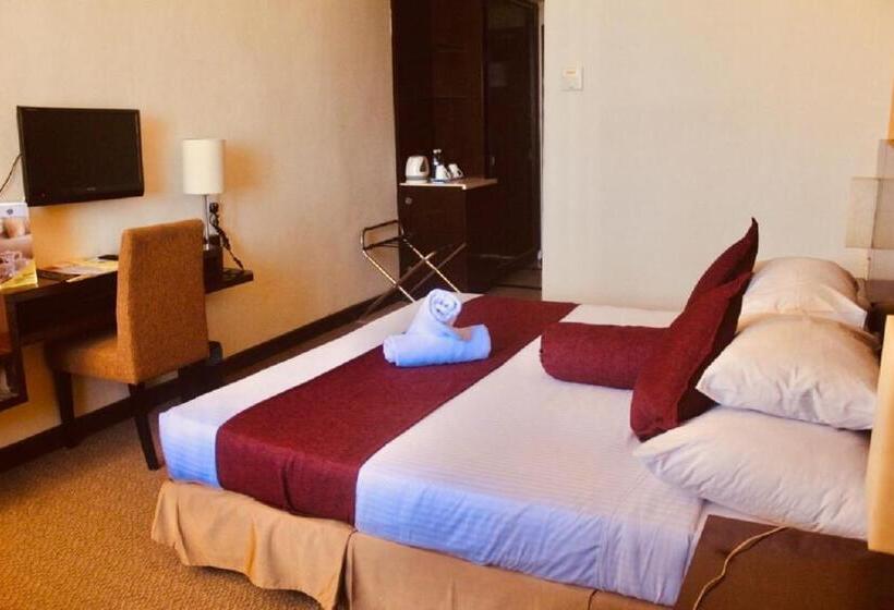 Отель The Grand Puteri