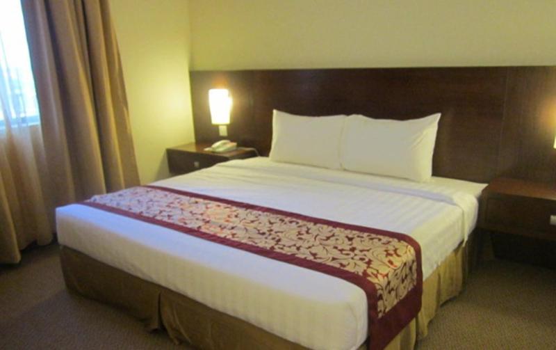 Отель The Grand Puteri