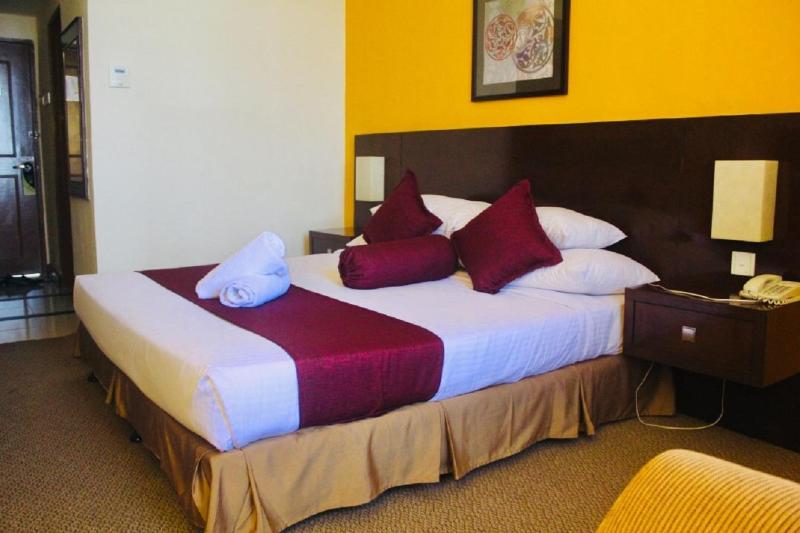 Отель The Grand Puteri