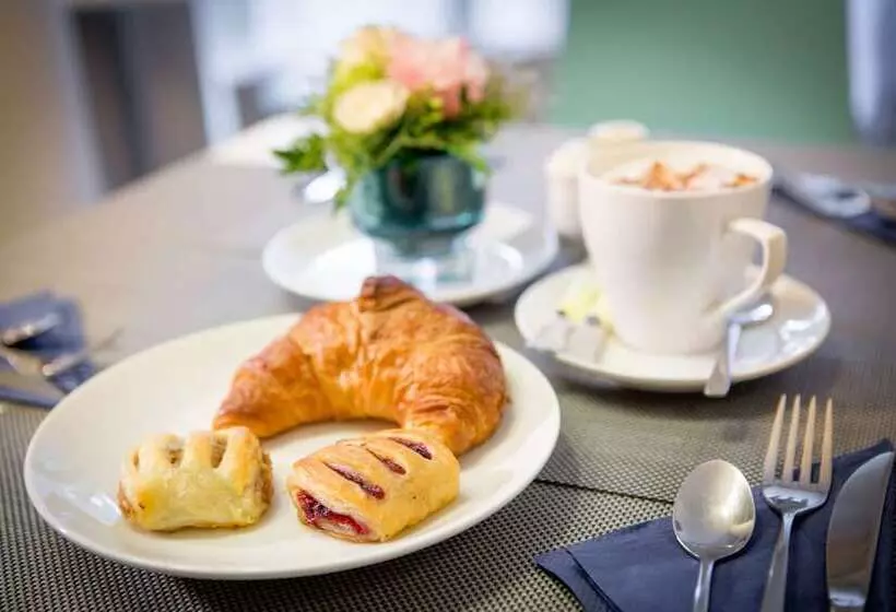 Escala Hotel & Suites