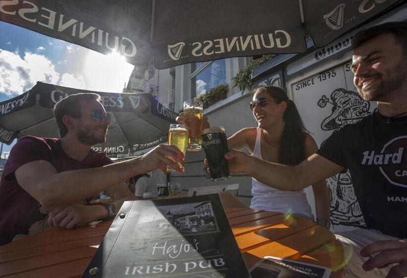 Отель Hajo´s Germania Lodge & Irish Pub