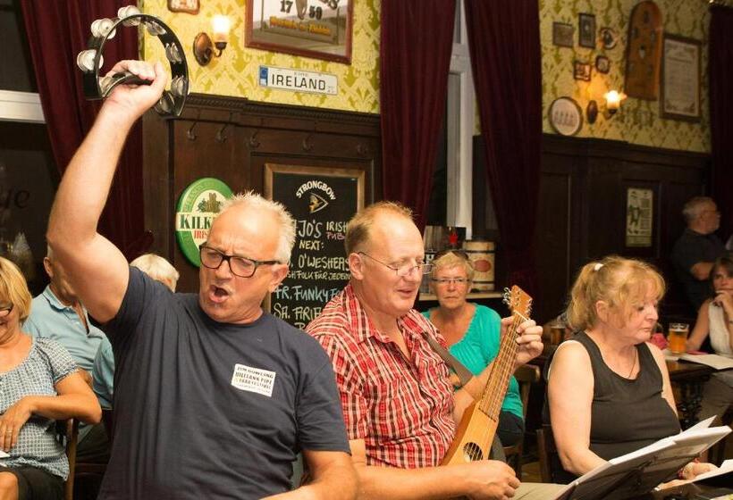 Отель Hajo´s Germania Lodge & Irish Pub