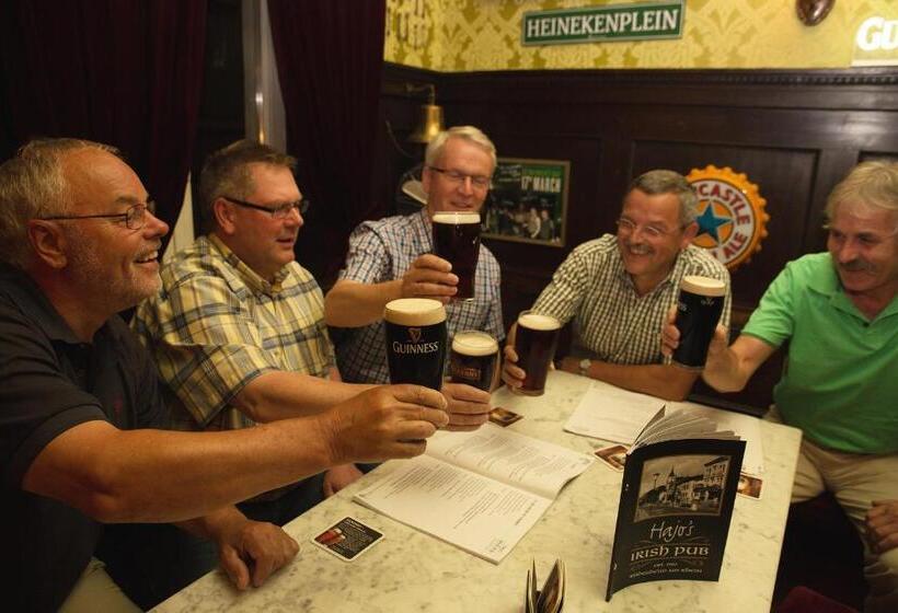 Отель Hajo´s Germania Lodge & Irish Pub