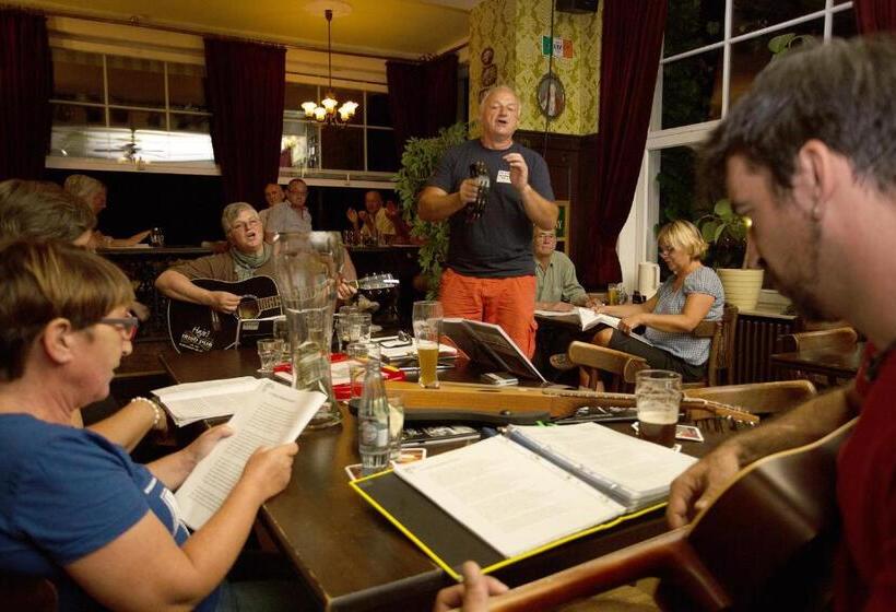 Отель Hajo´s Germania Lodge & Irish Pub