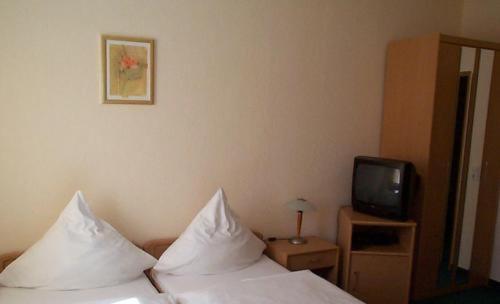 Отель Merkur Garni