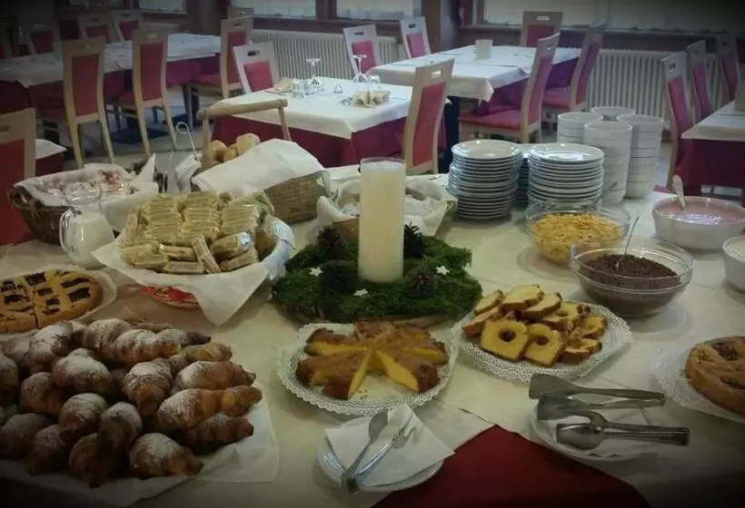 Отель Caminetto Mountain Resort