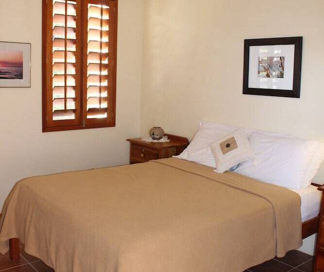 تختخواب و صبحانه The Crimson Orchid Inn At Orchid Bay