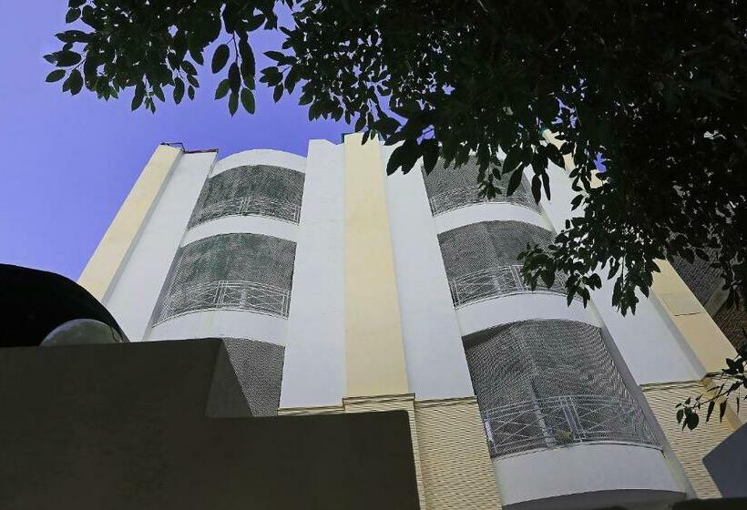 Capital O Hotel Perfect Inn