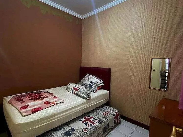 Hotelli Spot On 91278 Pahlawan Udyana Syariah