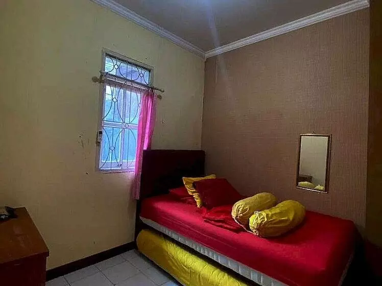 Hotelli Spot On 91278 Pahlawan Udyana Syariah