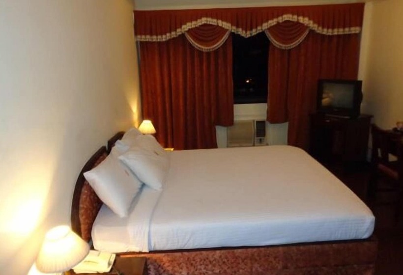 فندق Poonja International