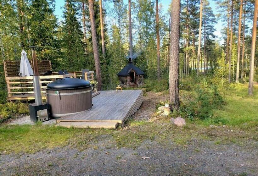 A Unique Cottage In A Pine Forest By The Lake
