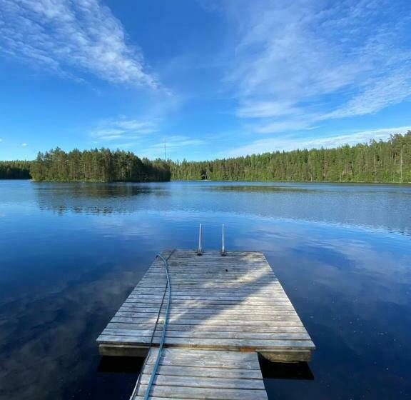 A Unique Cottage In A Pine Forest By The Lake