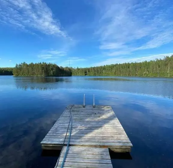 A Unique Cottage In A Pine Forest By The Lake