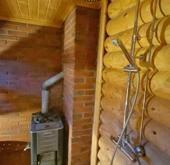 A Unique Cottage In A Pine Forest By The Lake