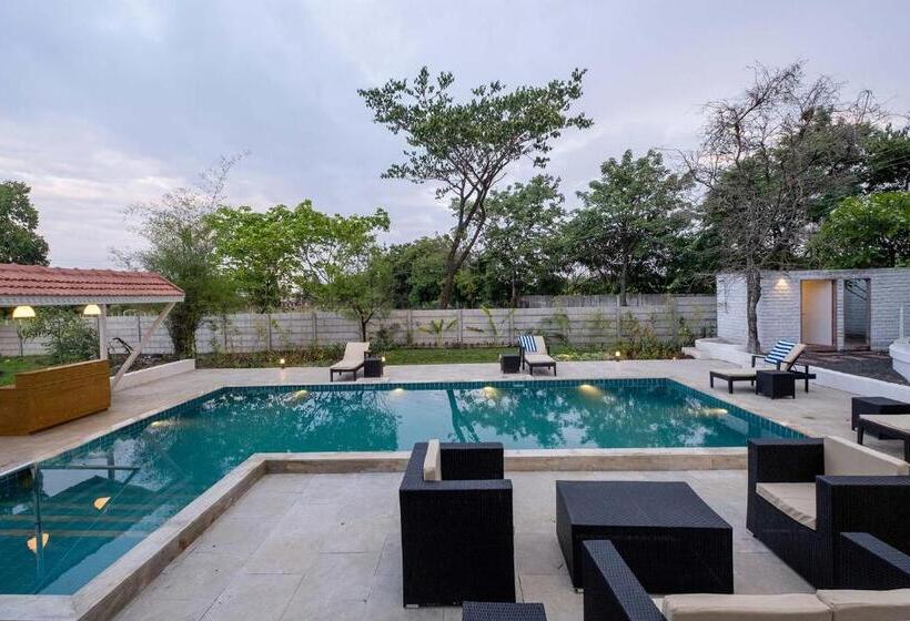 Stayvista S Villaggio Orchard Oasis With Pool, Expansive Lawn, Patio & Indoor Activities