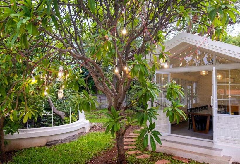 Stayvista S Villaggio Orchard Oasis With Pool, Expansive Lawn, Patio & Indoor Activities