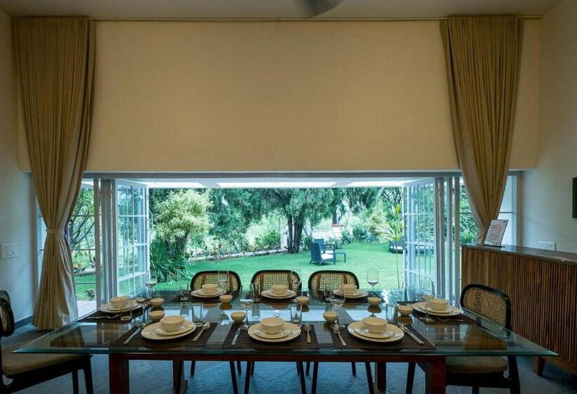 Stayvista S Villaggio Orchard Oasis With Pool, Expansive Lawn, Patio & Indoor Activities