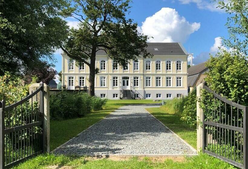 호텔 Ferienwohnungen Gut Oestergaard