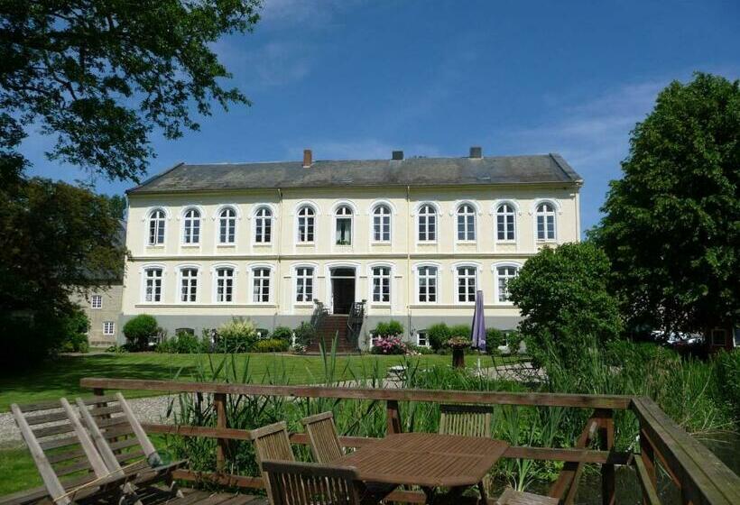 호텔 Ferienwohnungen Gut Oestergaard