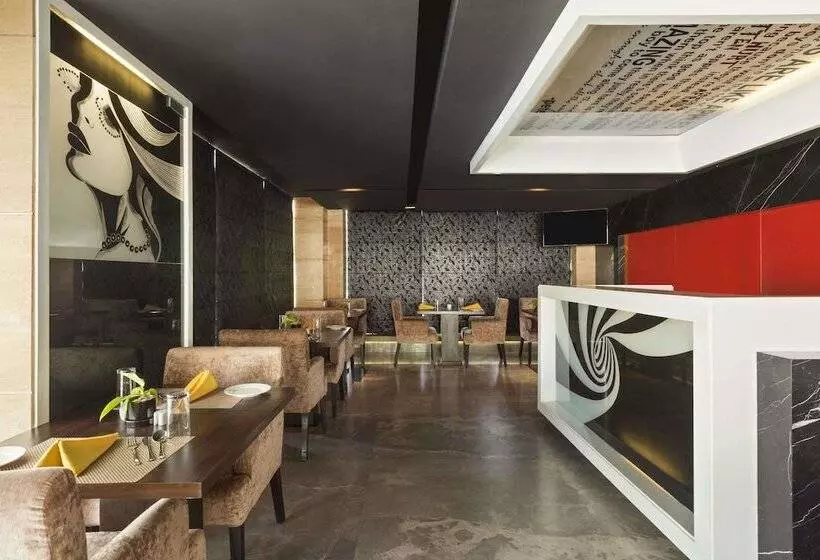 호텔 Ramada Encore Domlur Bangalore