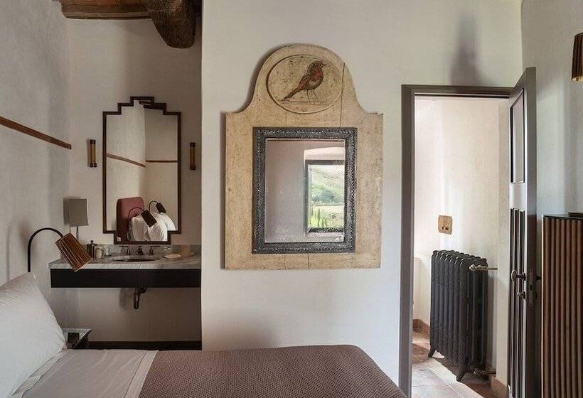 בית מלון כפרי Castello Di Reschio