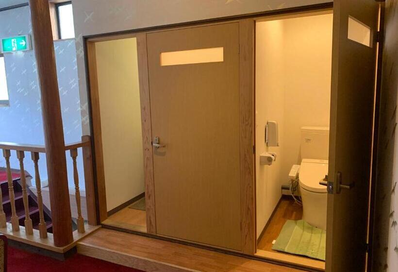 فندق 民宿ニュー万福茶屋