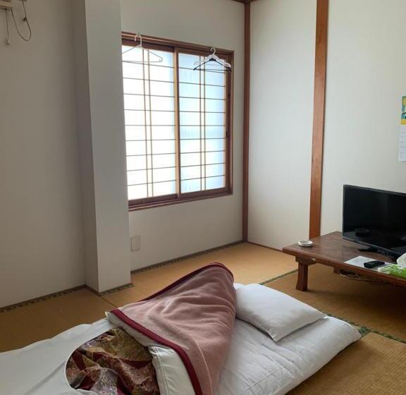 فندق 民宿ニュー万福茶屋