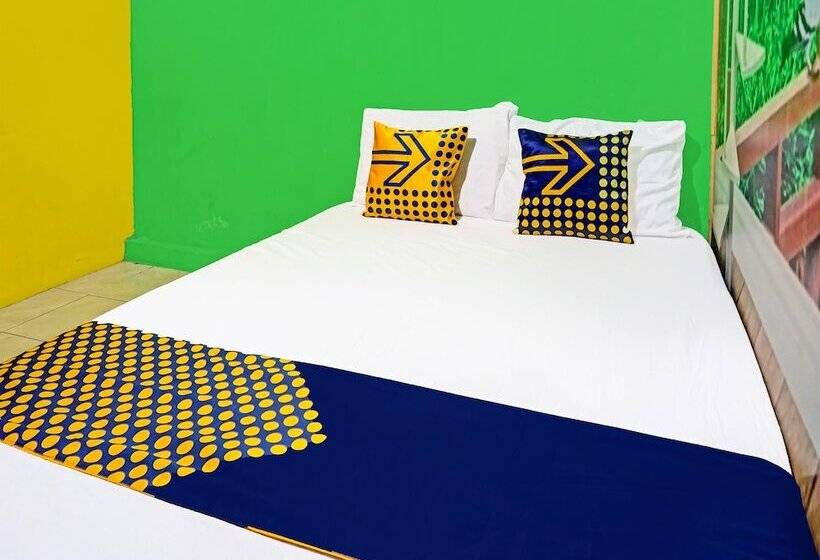 Отель Spot On 91697 Nyaman Homestay Syariah