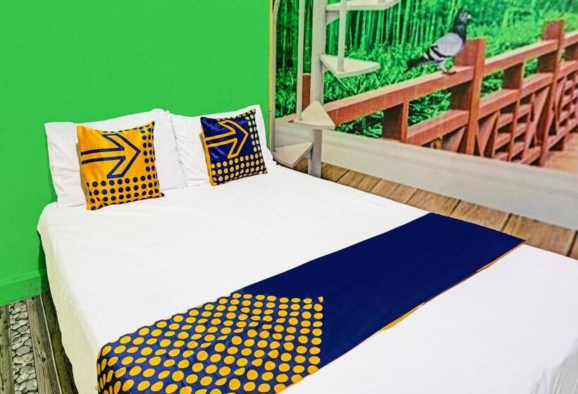 Отель Spot On 91697 Nyaman Homestay Syariah