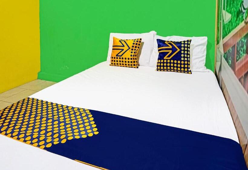 Отель Spot On 91697 Nyaman Homestay Syariah