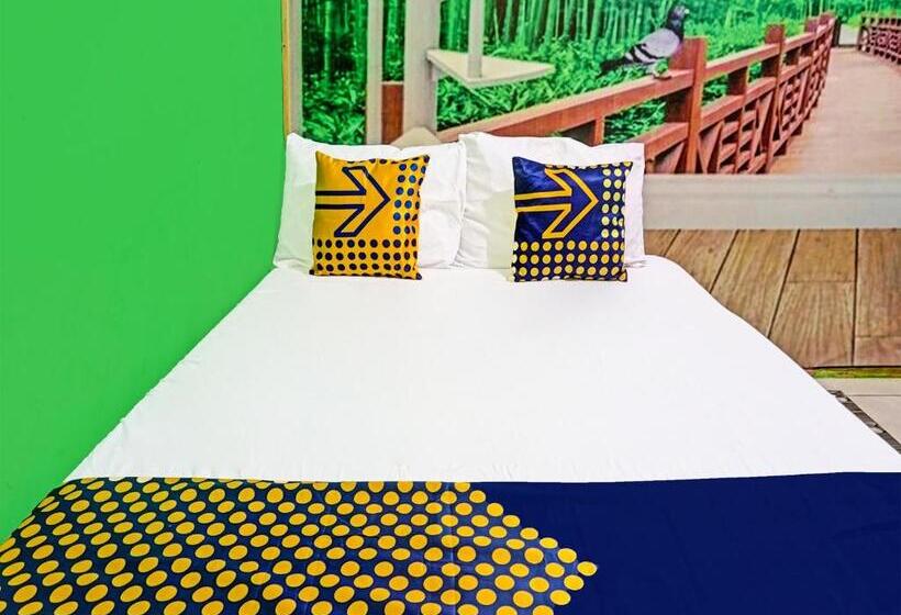 Отель Spot On 91697 Nyaman Homestay Syariah