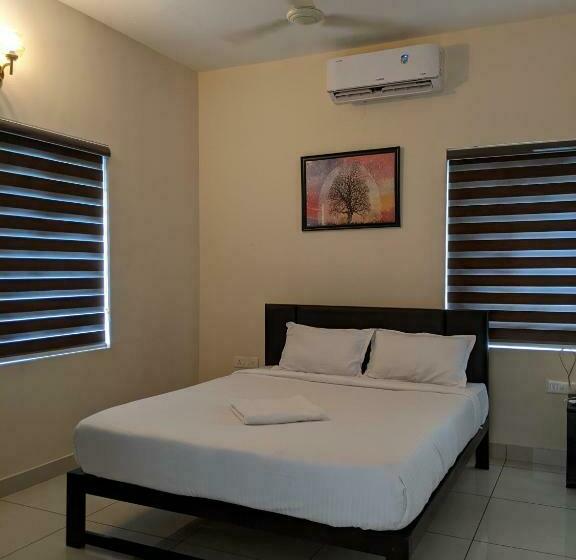 Hotel Atmos Inn Kozhikode