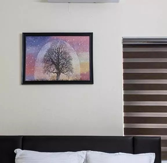 ホテル Atmos Inn Kozhikode