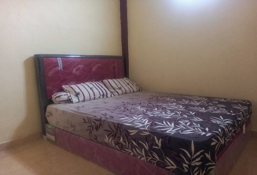 酒店 Oyo 90731 Ekreasi Home