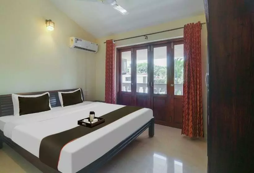 ホテル Capital O Varca Holiday Suites